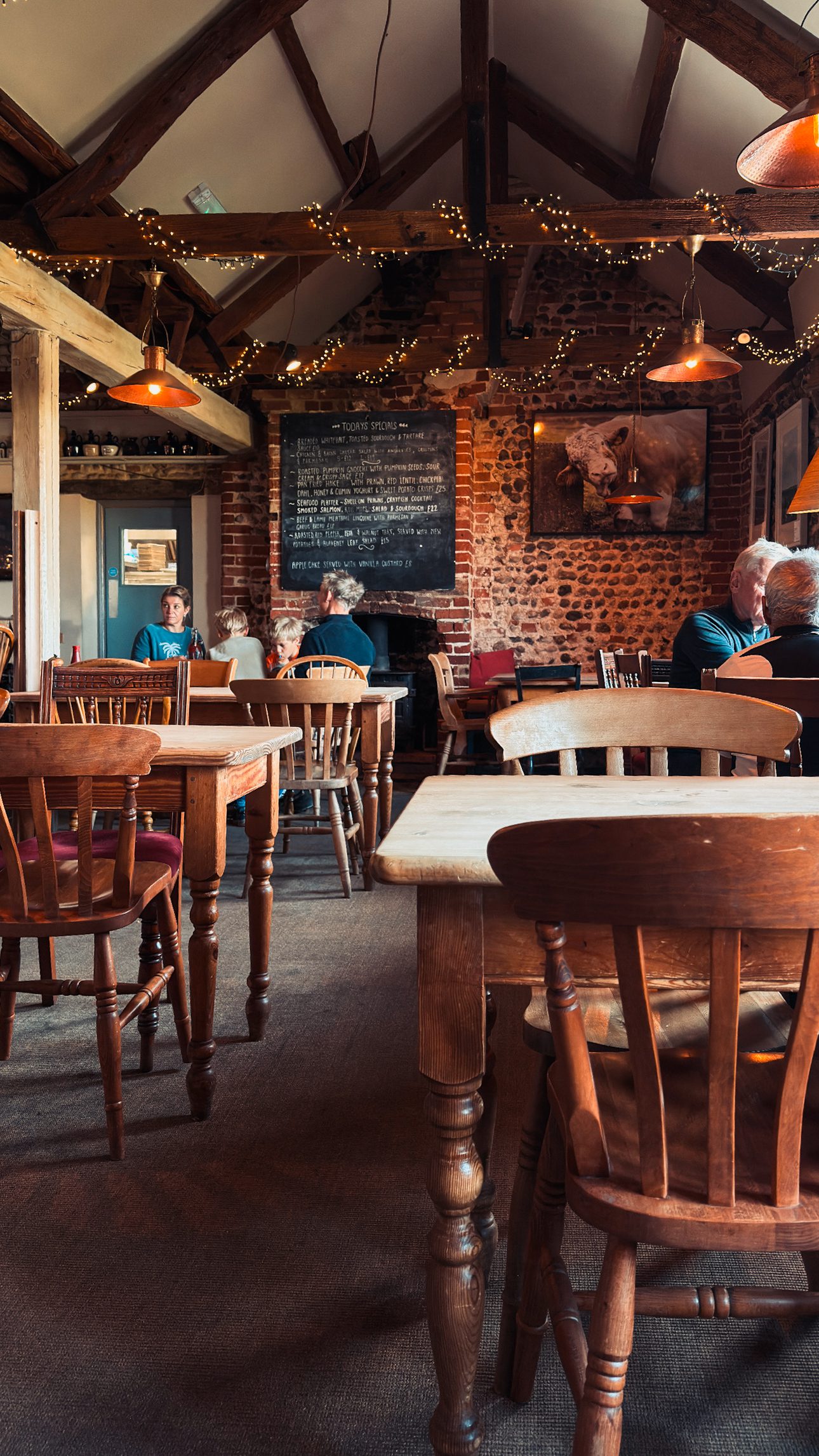 The Dun Cow pub at Salthouse with marshland views